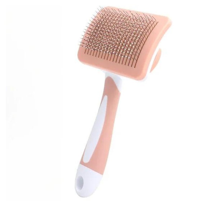 Une brosse pour chat orange 