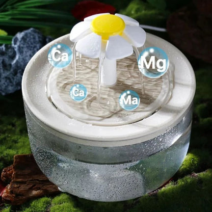 Fontaine à eau automatique silencieuse, mettant en avant sa filtration des minéraux comme le calcium et le magnésium.